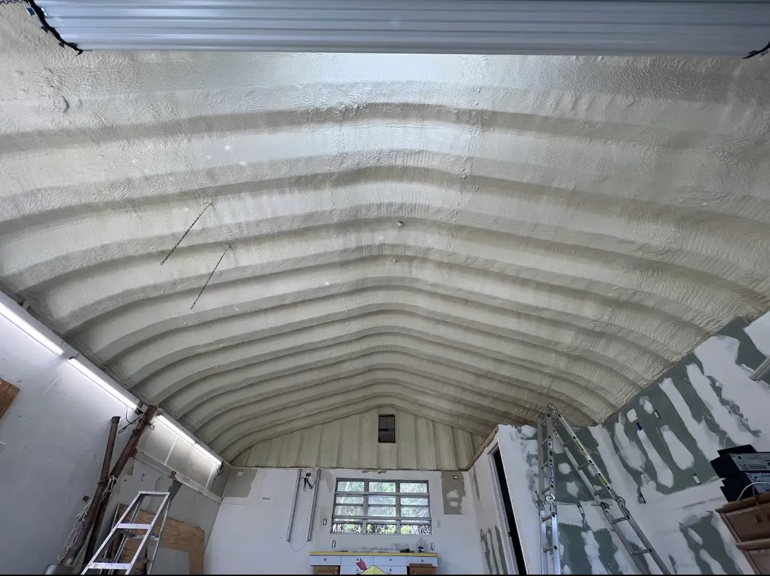 Spray polyurethane foam applied to the underside of a metal roof deck in Lindenwold